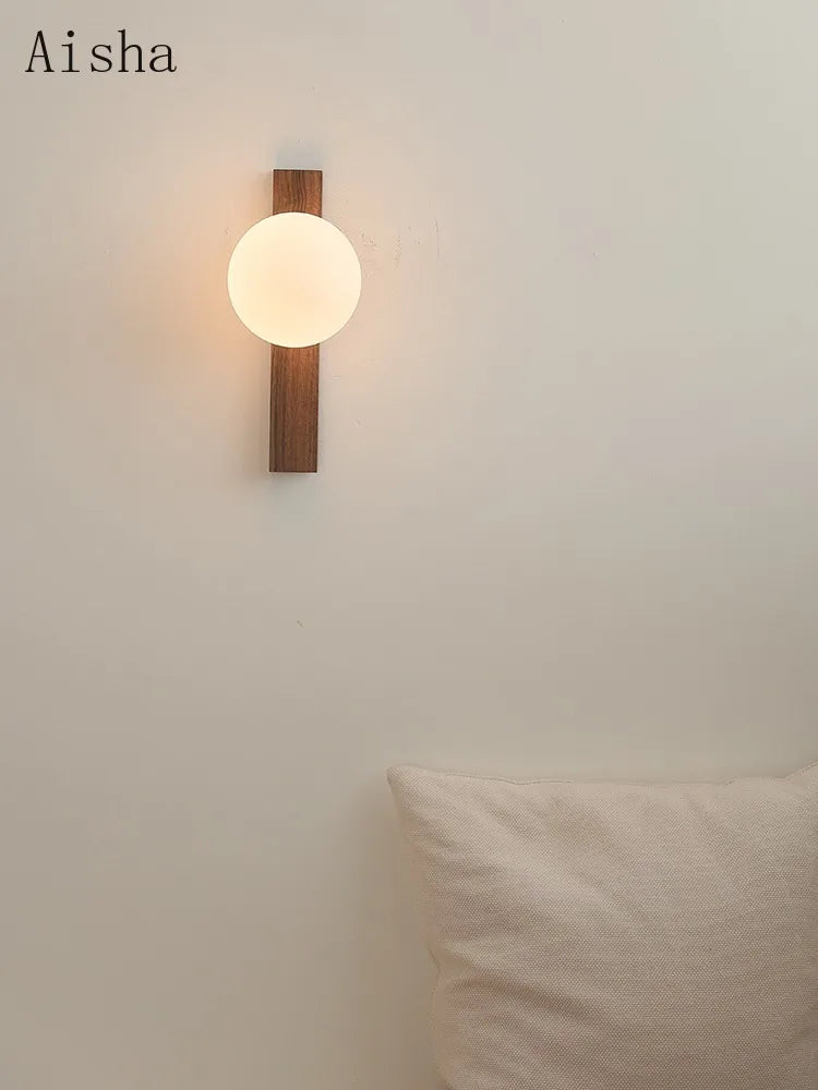 Retro walnut wall light with decorative glass
