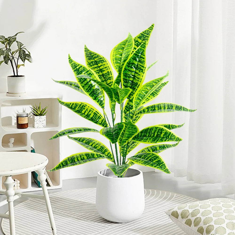 Artificial monstera plant with decorative tropical leaves for indoor garden