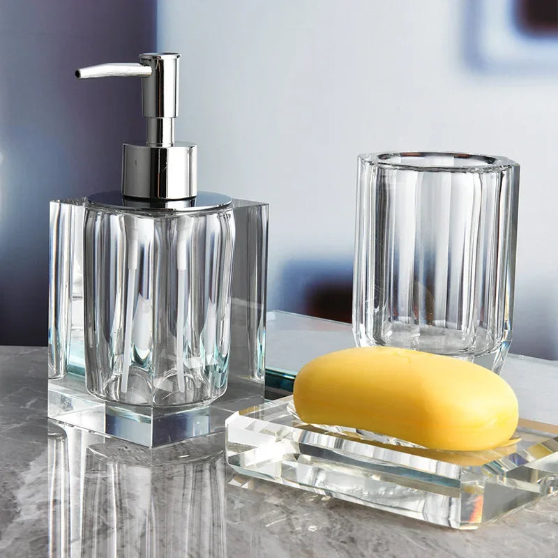 set of glass bottles for soap and bathroom accessories