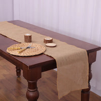 Beige jute-style table runner with tassels