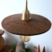 Carved wood pendant light for elegant interior decor
