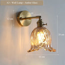 Modern adjustable vintage brass and glass wall lamp