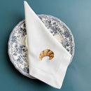 Embroidered linen napkin with croissant motif, customisable