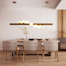 Modern walnut wood and glass chandelier for an elegant interior