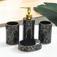 set of four ceramic bathroom accessories