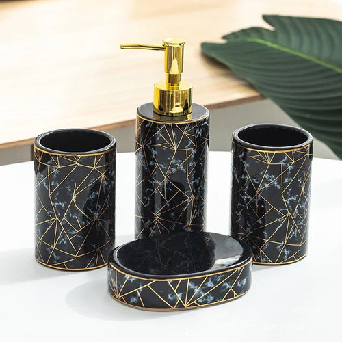 set of four ceramic bathroom accessories