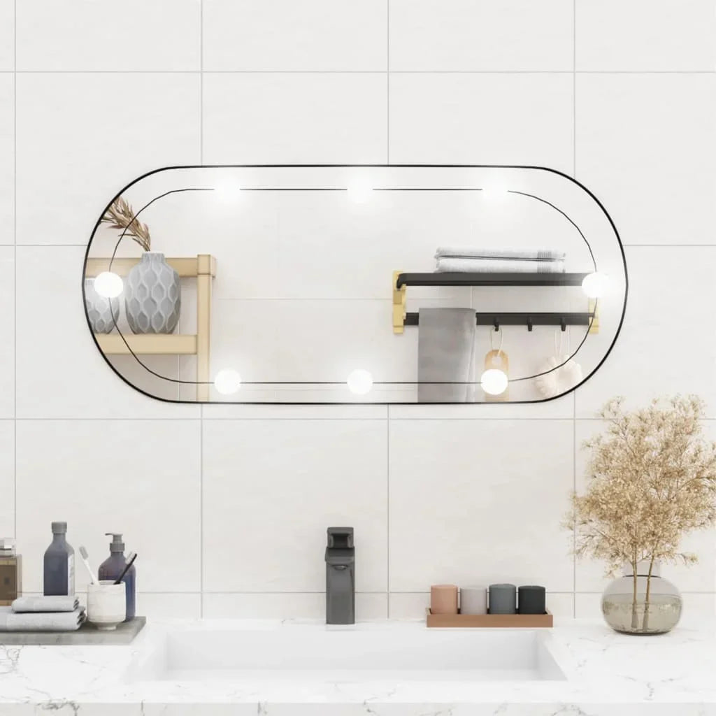 oval wall mirror with LED lights in decorative glass