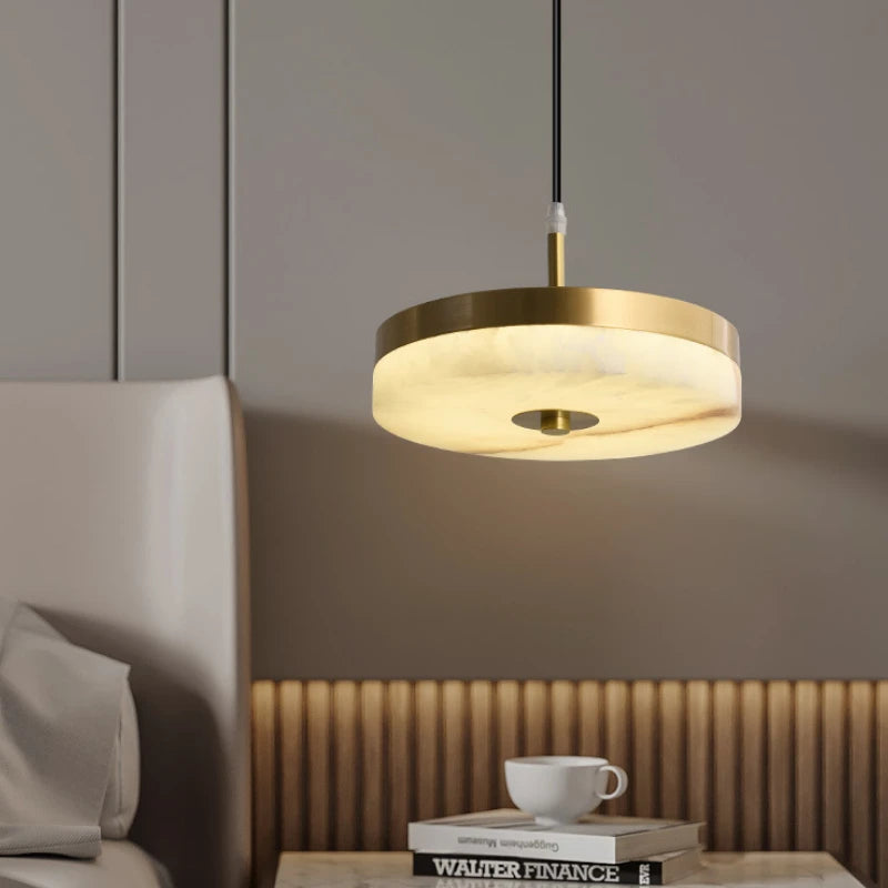 White marble and copper pendant light for elegant interiors