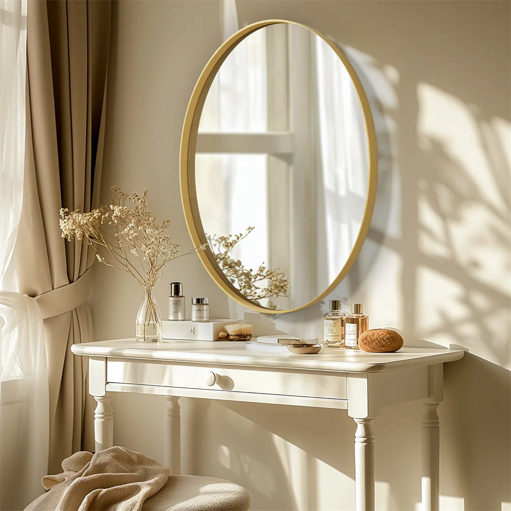 Brushed gold mirror with decorative metal frame