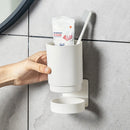 Wall-mounted organiser for toothbrushes and cup
