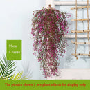 Rattan wall decoration with leaves and golden bell