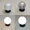 Outdoor black globe post lamp for garden and terrace lighting