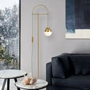 Retro gold Nordic floor lamp for elegant interiors