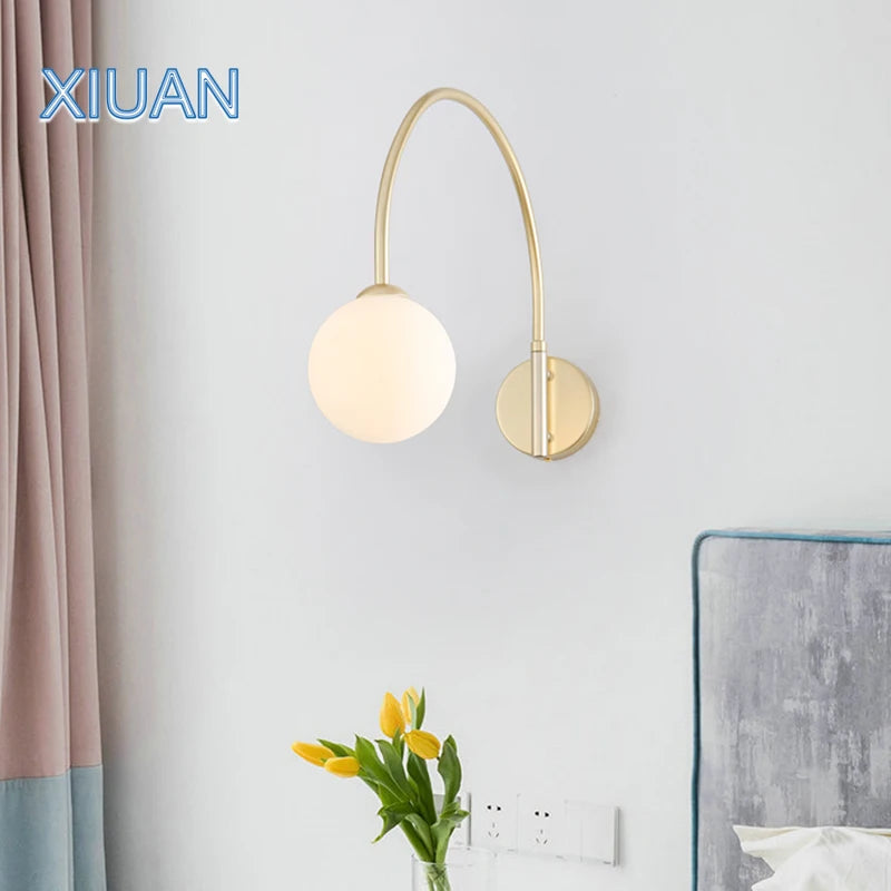 Decorative glass swing arm wall light for elegant interiors