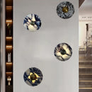 Art deco style wall light in stone and gold metal