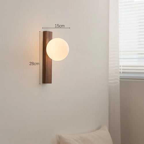 Retro walnut wall light with decorative glass