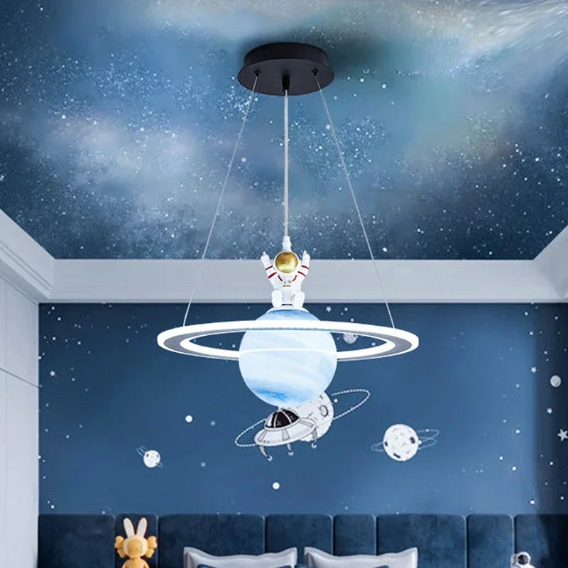 Nordic astronaut and planet pendant light