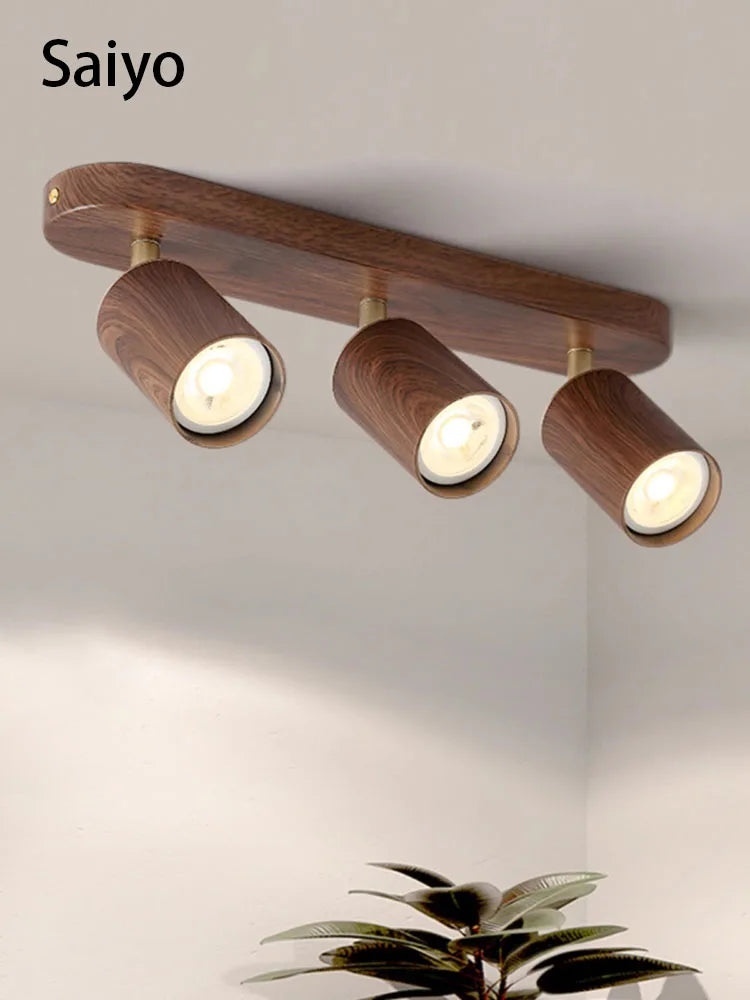 Surface mounted LED spotlight with replaceable bulb and adjustable heads