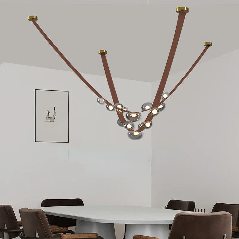 Sandyha leather chandelier with modern LED pendant design