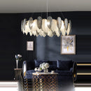 Art deco inspired LED crystal chandelier with white and grey feathers