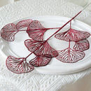Set of artificial ginkgo, eucalyptus and holly leaves for floral decoration