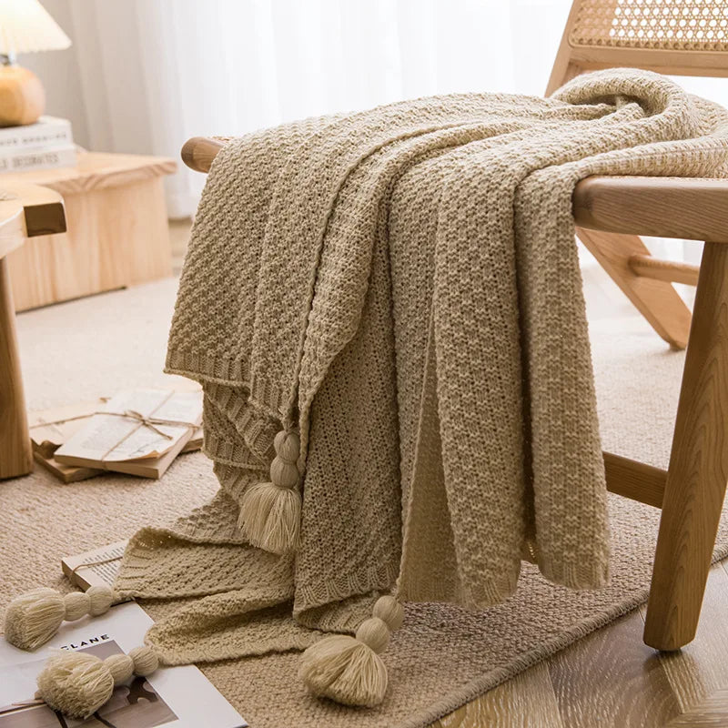 Chunky waffle knit throw with pom poms nordic style