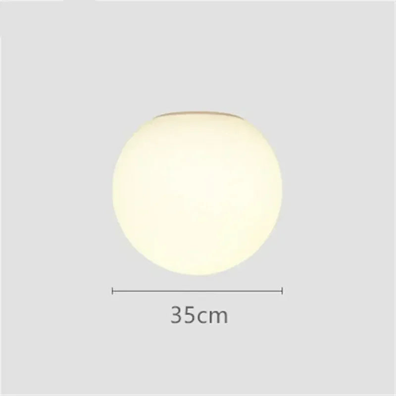 Modern LED wall light with round white glass shade - vue 9 sur 10