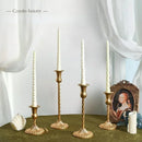 Retro gold spiral candlestick holders for romantic decorations and candlelit dinners