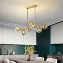 Suspended copper chandelier with glass globe for interior decoration