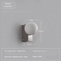 Minimalist stainless steel wall light for modern interiors