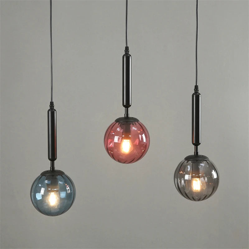 Glass pendant light for restaurant and bar lighting