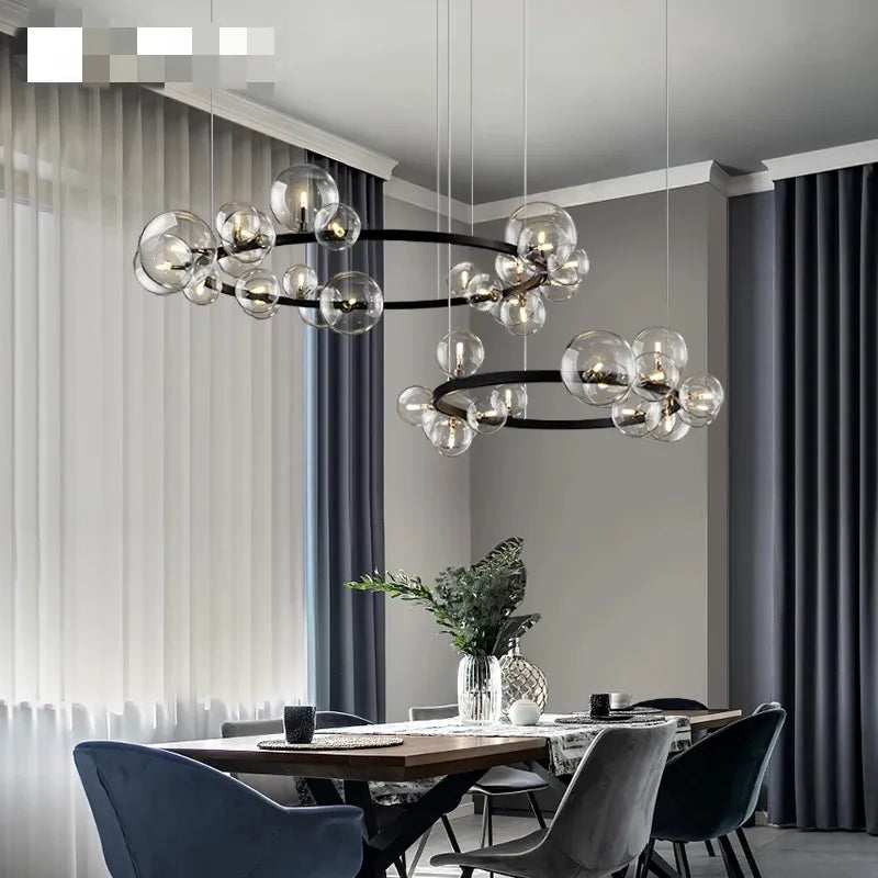 Round designer chandelier with clear glass LED globes