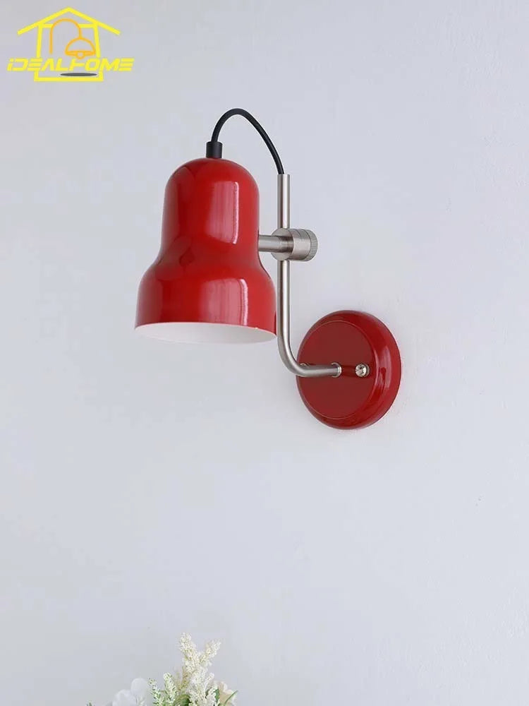 Vintage medieval style adjustable LED wall light in iron, warm ambience