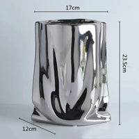 ceramic vase with silver frills for decorative flowers