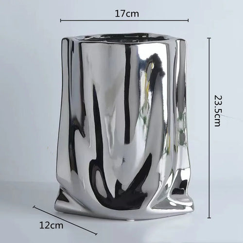 ceramic vase with silver frills for decorative flowers
