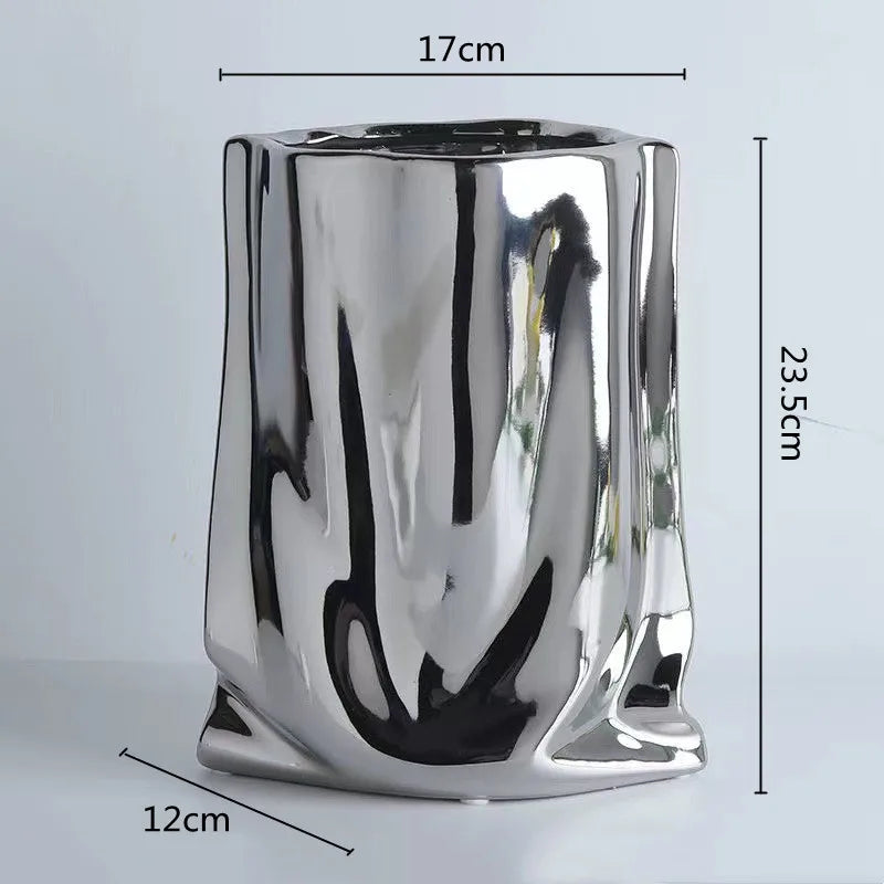 ceramic vase with silver frills for decorative flowers