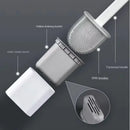 Wall-mounted toilet brush with drainable base, no drilling required