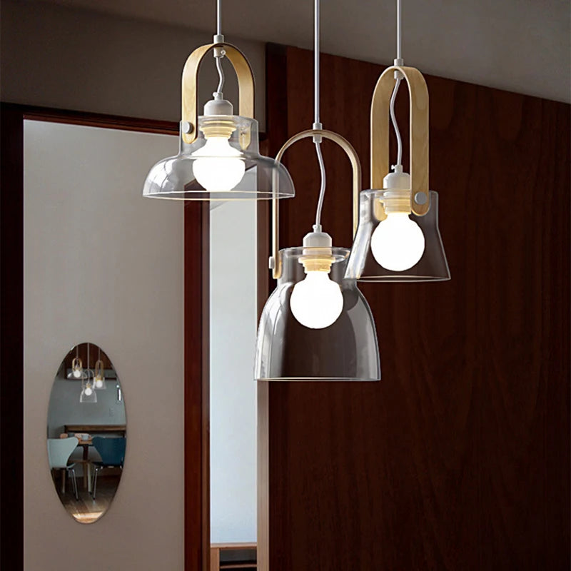 Clear glass pendant light with adjustable cord for interior decor