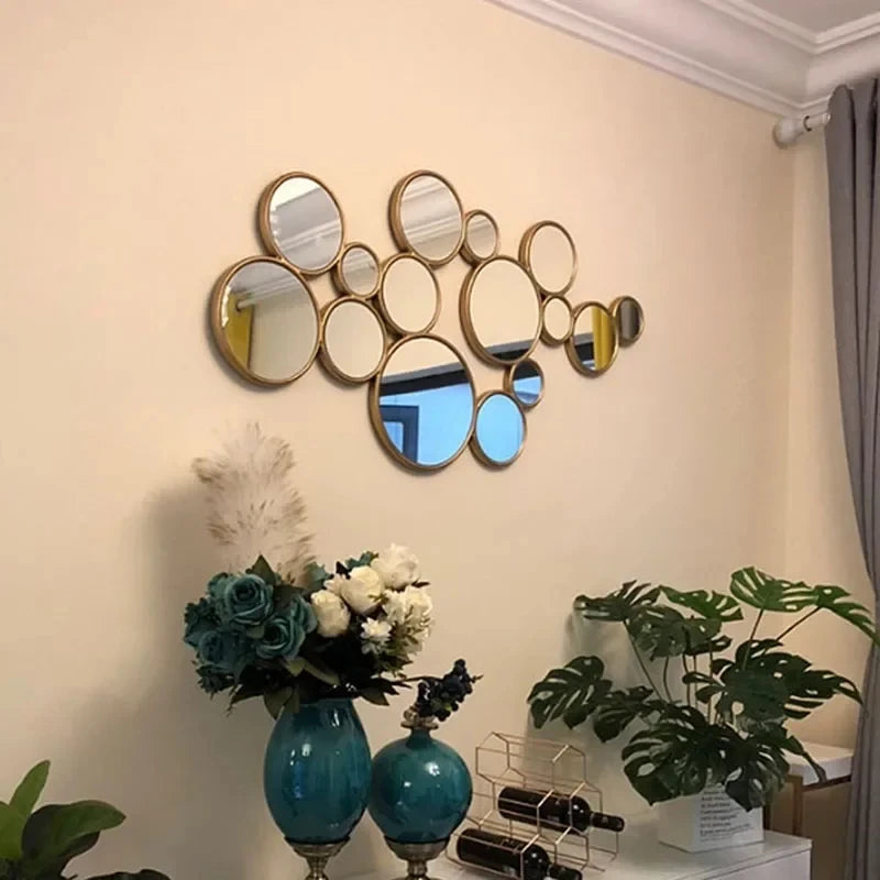 sun-shaped resin wall decor with hanging mirror