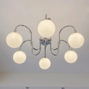 Modern chrome chandelier with glass pendant