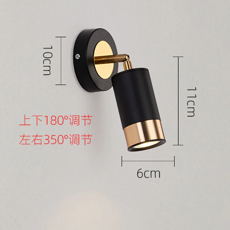 Modern rotating wall light with decorative LED spotlight