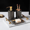 Ceramic soap dispenser and gold bathroom accessories set