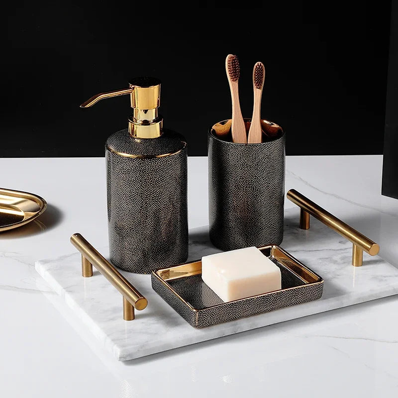Ceramic soap dispenser and gold bathroom accessories set