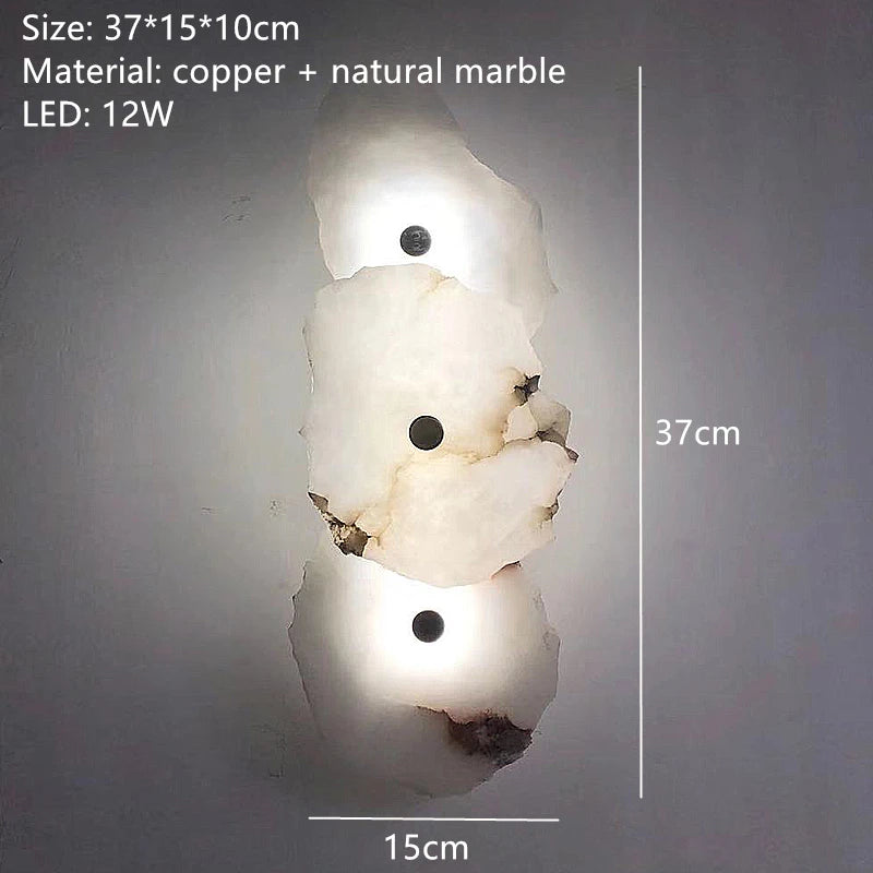 Art deco wall light in brass and unique natural marble
