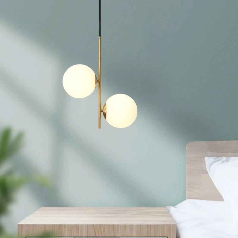 Modern glass and black brass pendant light with luminous design