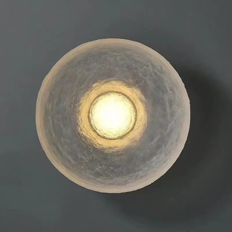 Contemporary circular lamp in transparent resin for modern interiors