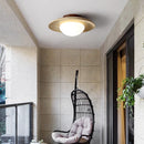 Wabi sabi travertine disc ceiling light for indoor and outdoor use