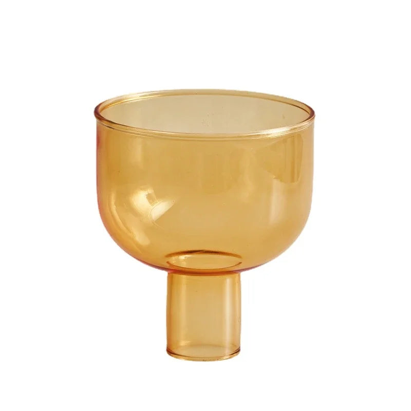 Decorative glass candle holder for candles and plants