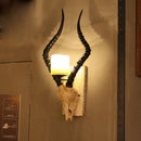 Sheep horn wall light for industrial decor