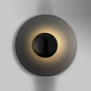 Modern circular designer wall light for an elegant interior